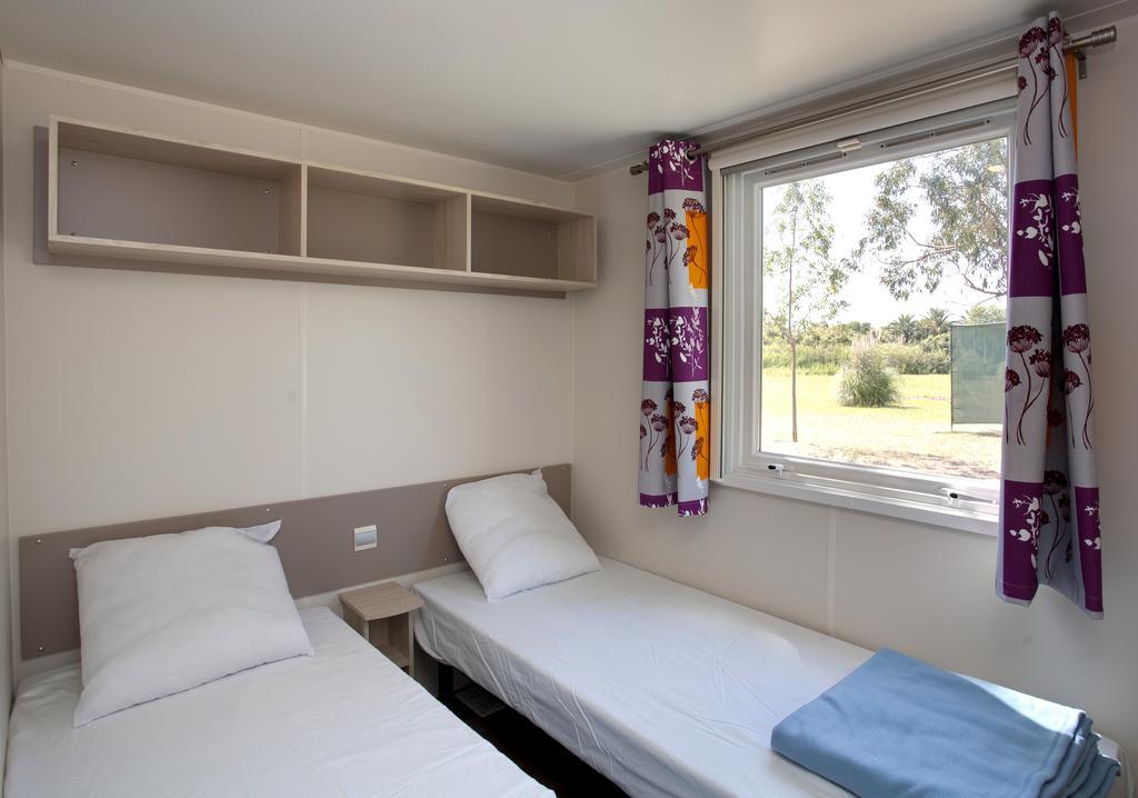Hotel Camping Miami Plage Poggio Mezzana Habitación foto